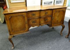 CROSS-BANDED MAHOGANY SERPENTINE SIDEBOARD circa 1930s, label for Alfred Allen of Birmingham,