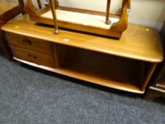 An Ercol Golden Dawn Minerva coffee table with two drawers & lower shelf