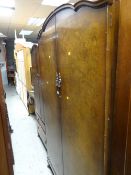 A three-piece vintage bedroom suite