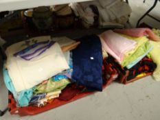 Two crates of various patterned sari's