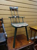 A three-legged elm seat spindle backed child's chair