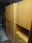 A parcel of lightwood bedroom furniture