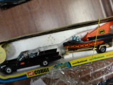 A boxed Batmobile & Batboat (box damaged)