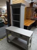 A parcel of grey painted pine furniture including a narrow bookcase, console table together with
