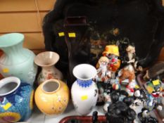 A painted papier mache decorated tray together with a collection of various clown figures