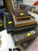 A parcel of various vintage ephemera, postcards, notebooks etc