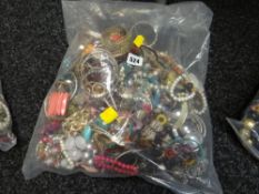 A large parcel of costume jewellery, bangles, necklaces etc
