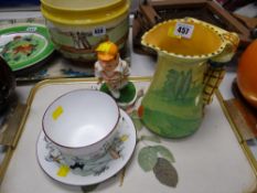 A Crown Staffordshire Queensbury golfing large cup & saucer, a Burleighware golfing handled jug &