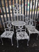 White painted metal circular garden table & five matching chairs (outside)