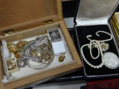 A carved mother of pearl brooch, small pearl necklace, box of yellow & white metal jewellery