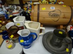 A parcel of brewery related items, water jugs, novelty whiskey barrel together with four pewter