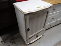 Parcel of furniture to include a distressed painted white high back chair, coffee table