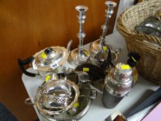 Pair of good EPNS candlesticks, three-piece teaset, cocktail shaker etc