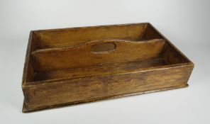 A RUSTIC TWIN COMPARTMENT CUTLERY TRAY with loop centre handle, 32cms long (BBC Bargain Hunt)