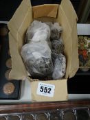 A collection of bagged pre-decimal coinage
