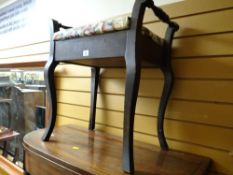 A box seat piano stool