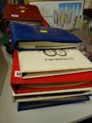 Various albums including stamp postcards, loose stamps, Commonwealth & Silver Jubilee issue albums