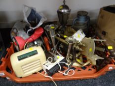Crate of various household items including storm lamp, clock radio, telephone, glass lamp shade,