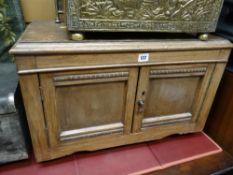 A two-door small vintage cupboard