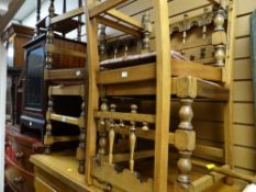 A set of four carved back antique reproduction kitchen chairs