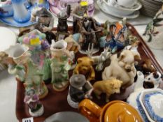 A tray of various mixed ceramics including continental figures, ceramic animals etc