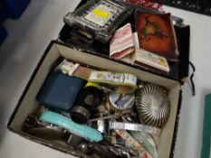 A hallmarked silver photograph frame, silver mounted needle box, small parcel of coinage &