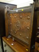 A good Arts & Crafts Tudor Rose copper fire-screen & another