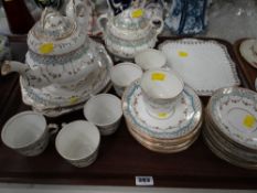 A tray of vintage English Staffordshire turquoise & gilt decorated teaware