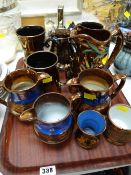 A tray of various lustre ware jugs, mugs, tankards etc
