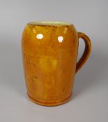 AN EWENNY POTTERY TANKARD inscribed 'Eichy da' (the incorrect spelling of Iechyd Da - good