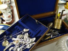 A canteen cutlery box containing a selecetion of knives & decorative spoons (not matching) & a set