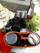 Cased set of Prinz Lux binoculars, Zenit camera together with an vintage Ilford camera