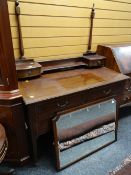 An Edwardian mahogany & inlaid dressing table with two short drawers above one long & two drawer