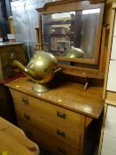A vintage three-drawer mirror back dressing table