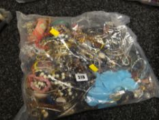 A large parcel of costume jewellery, bangles, necklaces etc