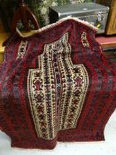 An old baluchi carpet, 140 x 95cms