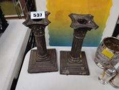 Pair of hallmarked silver short Corinthian columned candlesticks