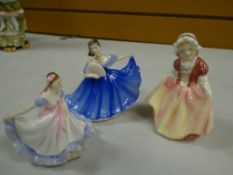 Three Royal Doulton boxed figures 'Elaine' - HN3214, 'Ninette' - HN3215 & 'Dinky Do' - HN2120