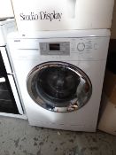 A Beko washing machine in white E/T