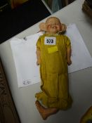 A late nineteenth century straw filled doll of the American comic character 'The Yellow Kid' (