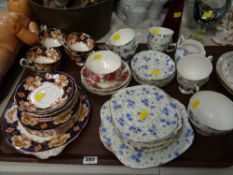 A tray of various patterned teaware including Royal Albert 'Old English Rose', Clarence bone