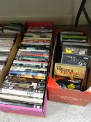 Two boxes of various DVDs