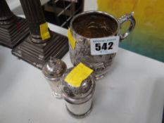 An Indian silver decorated small tankard together with two hallmarked silver pepperettes