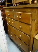 A faded mahogany antique chest of three long & two short drawers