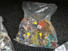 A large parcel of costume jewellery, bangles, necklaces etc
