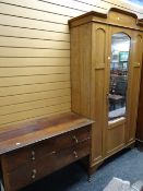 A neat Edwardian oak single mirror door wardrobe together with a vintage part dressing table