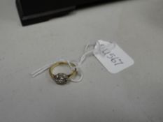 An 18ct gold diamond cluster ring