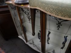 A kitsch fancy china cabinet