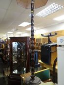 A reproduction mahogany standard lamp & shade E/T