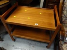 A retro teak tea trolley